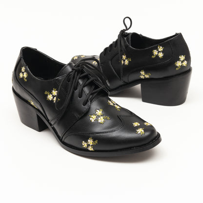 Leonor negro con flores