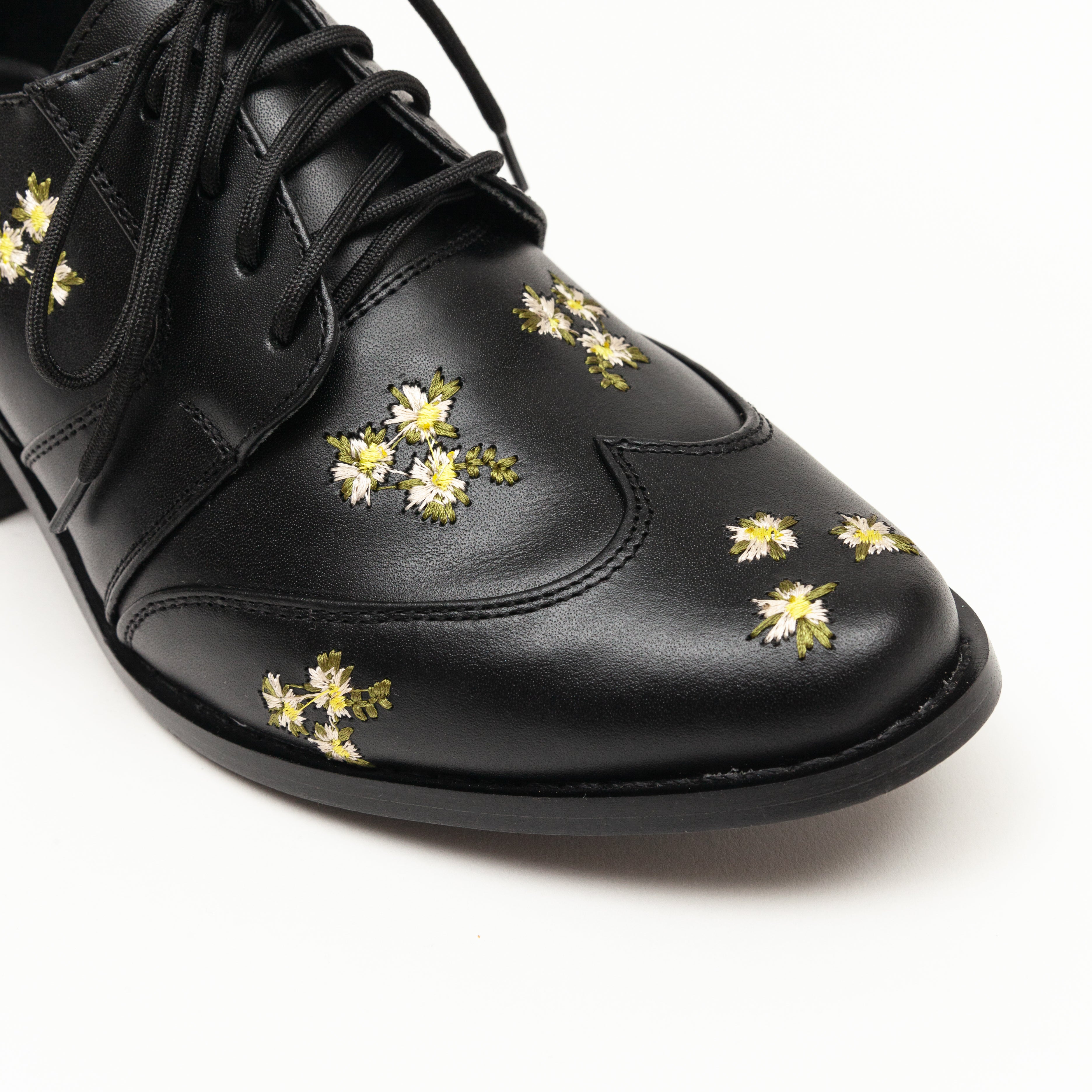 Leonor negro con flores