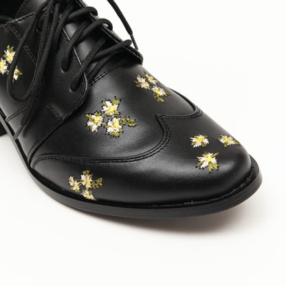 Leonor negro con flores